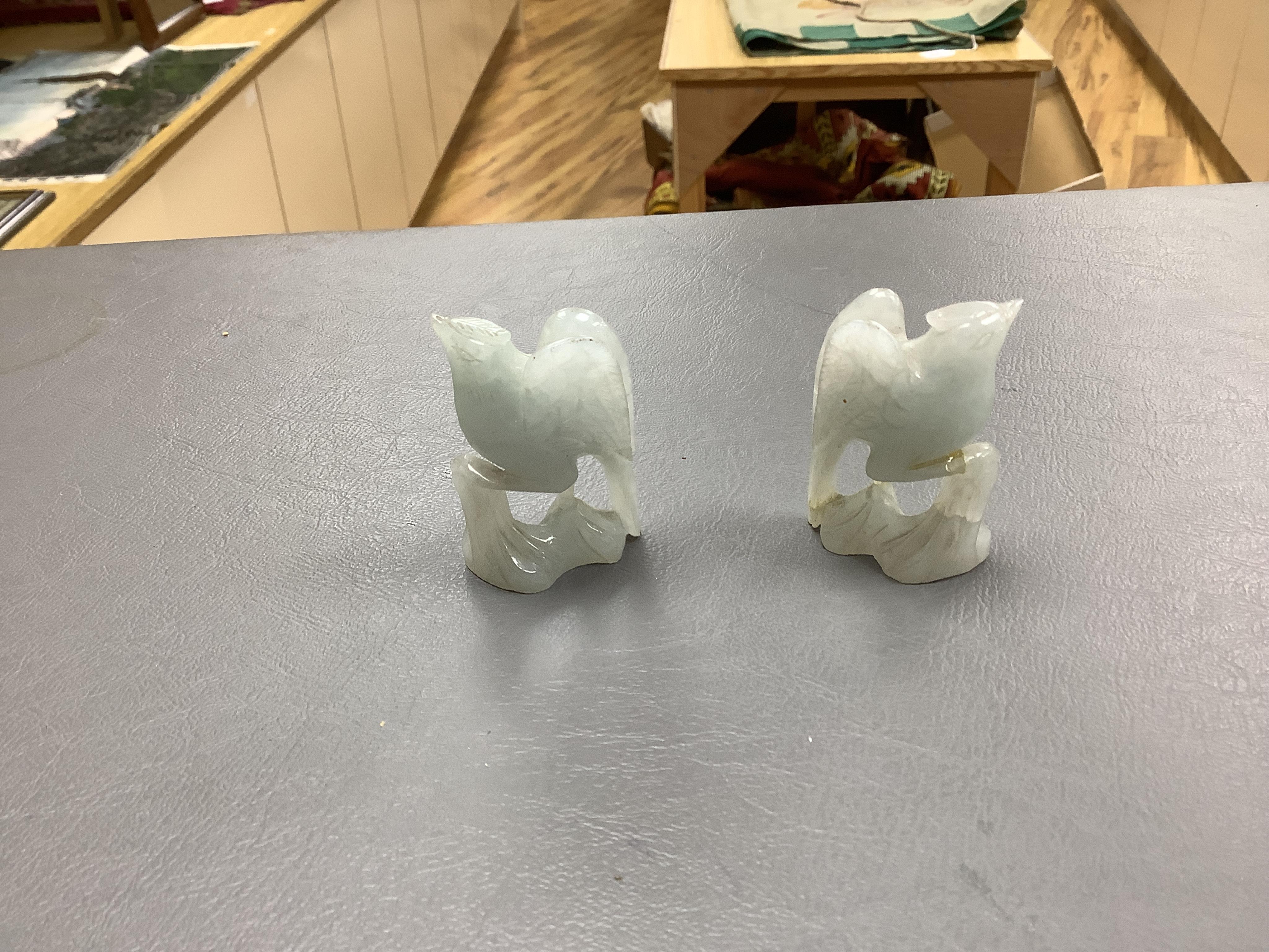 A Chinese jade figure of a Mandarin duck and a miniature pot and cover, three jadeite carvings and a bowenite dragon, 16.5cm